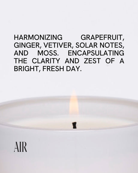 Air Candle by Free Yourself with harmonizing grapefruit, ginger, vetiver, solar notes and moss.