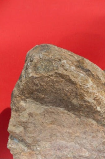 Create bold contrast. A surrealist study of perspective and angles in Amanda Rowan's Red Rock.