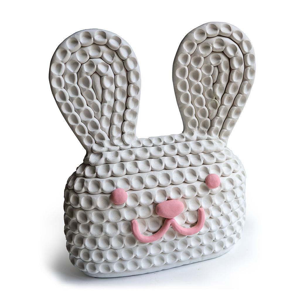 Chaucer, a white rabbit, is the newest fun folk-pop character from Austyn Taylor’s imagination, spreading joy, love, optimism and hope! We love the finger texture of Austyn's sculptures