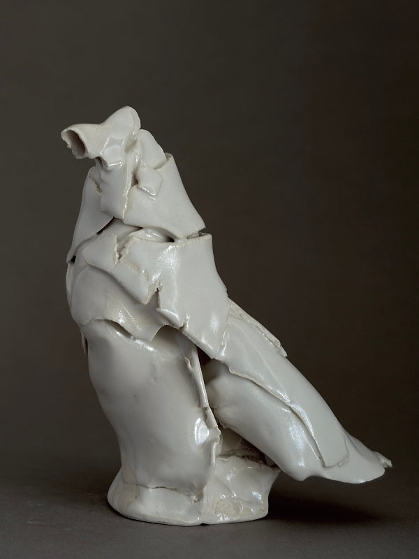 White ceramic porcelain sculpture of a bird