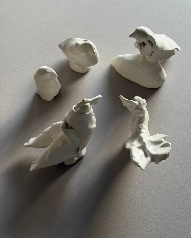 Group of David Duncan Livingston Bird Sculptures_at Poet and the Bench_Free Bird_Porcelain Sculptures