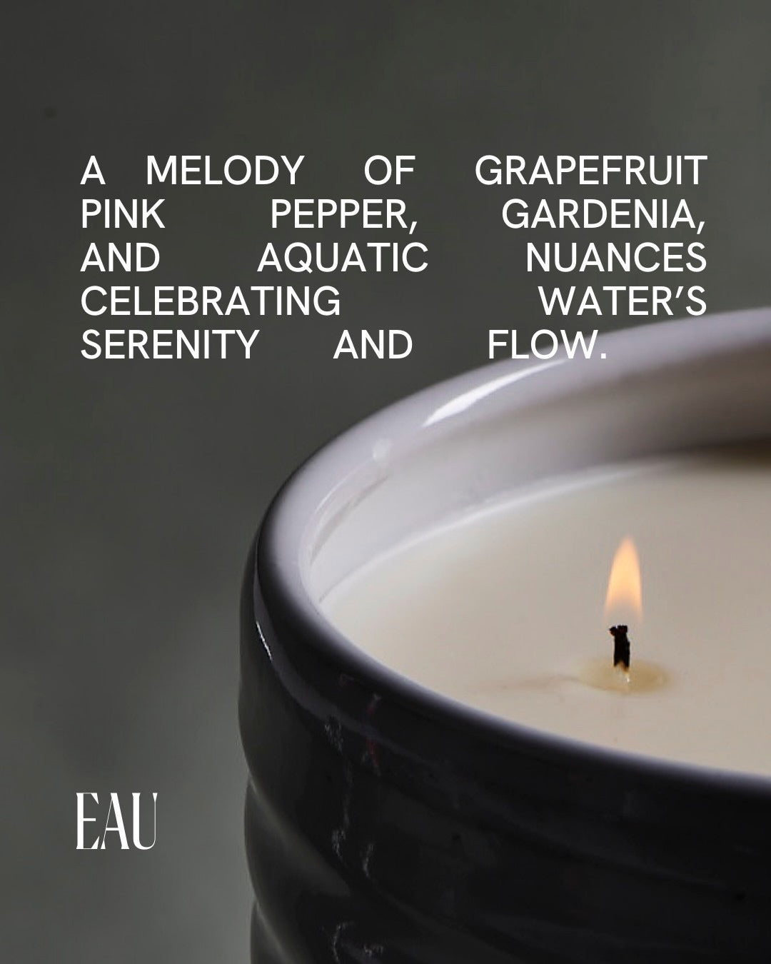 Eau Candle by Free Yourself. A melody of grapefruit, pink pepper, gardenia, and aquatic nuances.