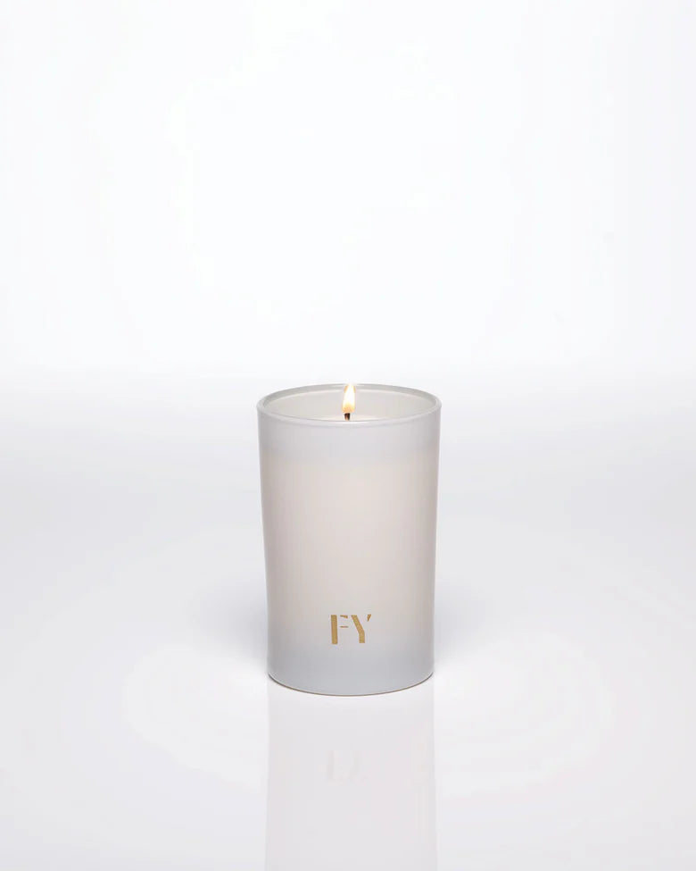 FEU candles by Free Yourself are a passionate declaration with a warm, spicy scent of clove, cinnamon, neroli, smoky woods and leather. The base of labdanum, tonka and cedarwood ensures a sensual, memorable finish. In a reusable 4oz glass tall votive vessel