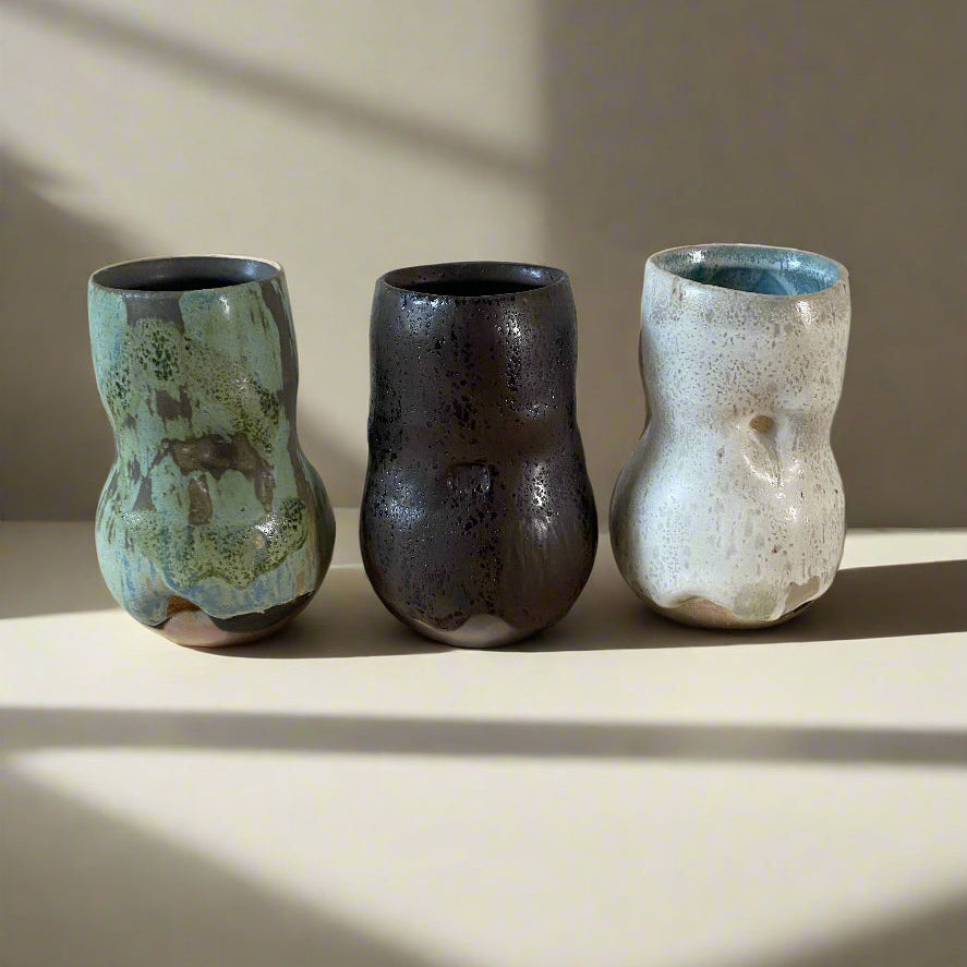 Ian Hazard Bill's iconic gesture vase in a mini version for smaller floral arrangements. We love each of the three glazes for how they capture the feeling of the seasons.
Ice (white/blue)
Earth (brown/black)
Sea (sage green) 