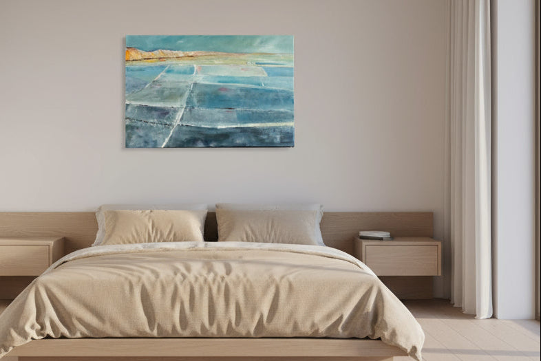 Modern bedroom with a bed, side tables, and an abstract topographical landscape painting on the wall.