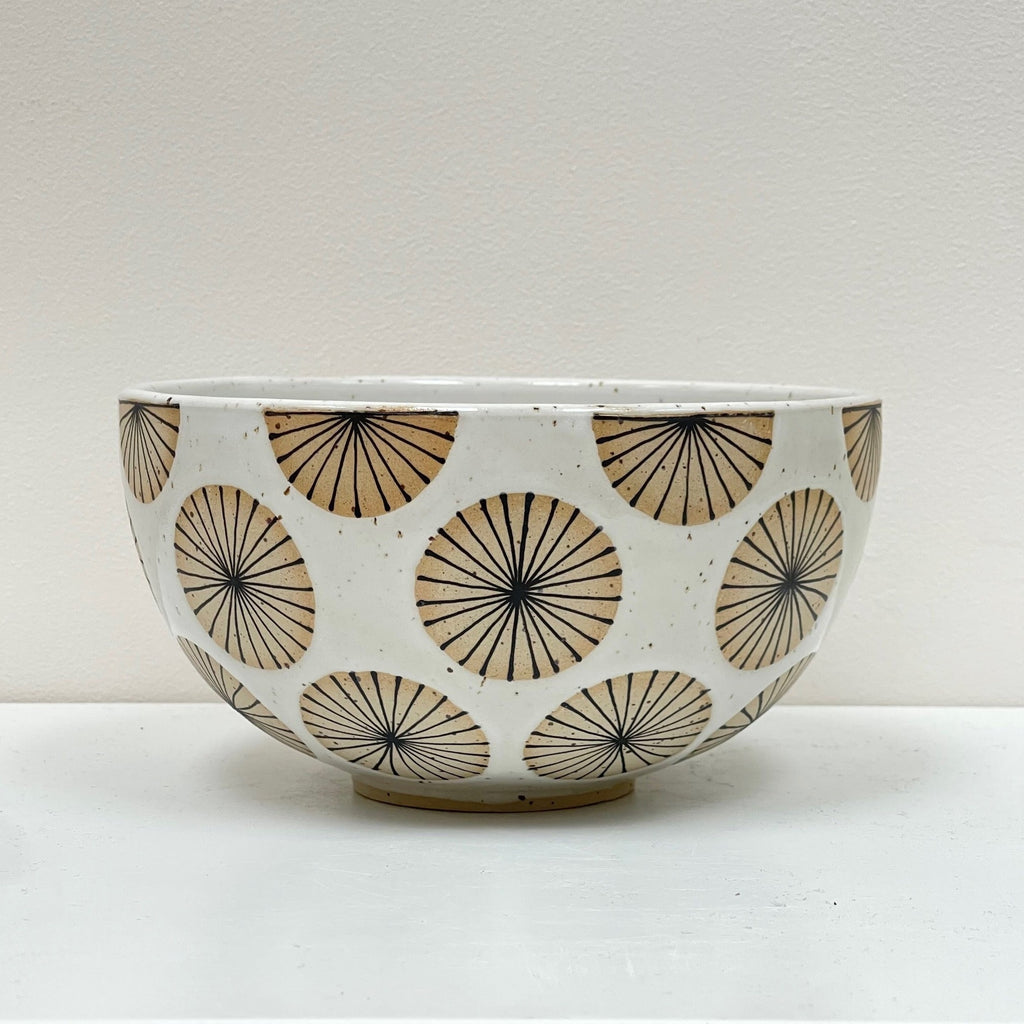 Pasta, quinoa, a layered green salad or beet salad. Start a new ritual with this perfectly sized medium bowl design decorated with radial circles.&nbsp;