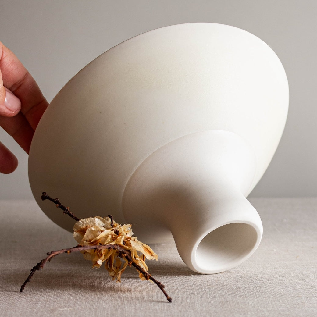 One of a kind white crystalline matte porcelain objects are mid-century Scandinavian inspired by Lisa Fleming.