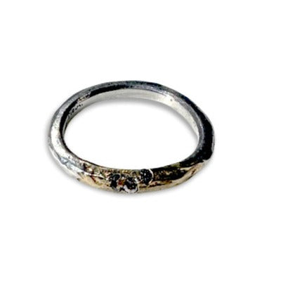 Mixed metals Lennard band has black diamonds cast in place in the 14k gold and sterling silver stacking ring–adds sparkle to those mixed metals!