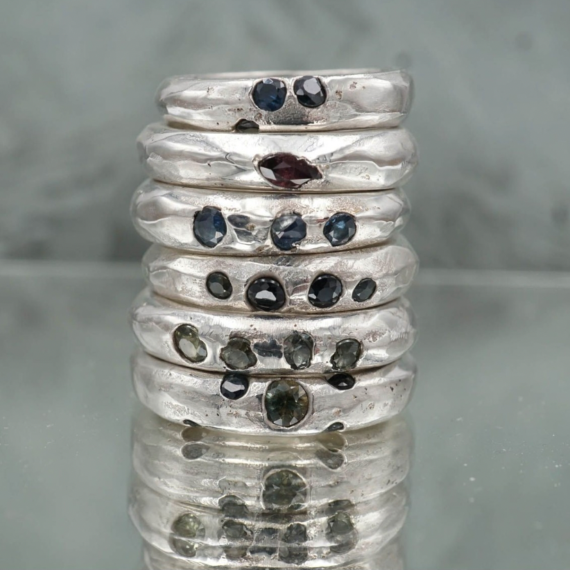 Gem stone stacking rings with a wabi-sabi aesthetic look amazing as a single or stack! These rings are created by pouring molten silver into a sand mould with either 3 sapphires, rubies or salt and pepper diamonds.