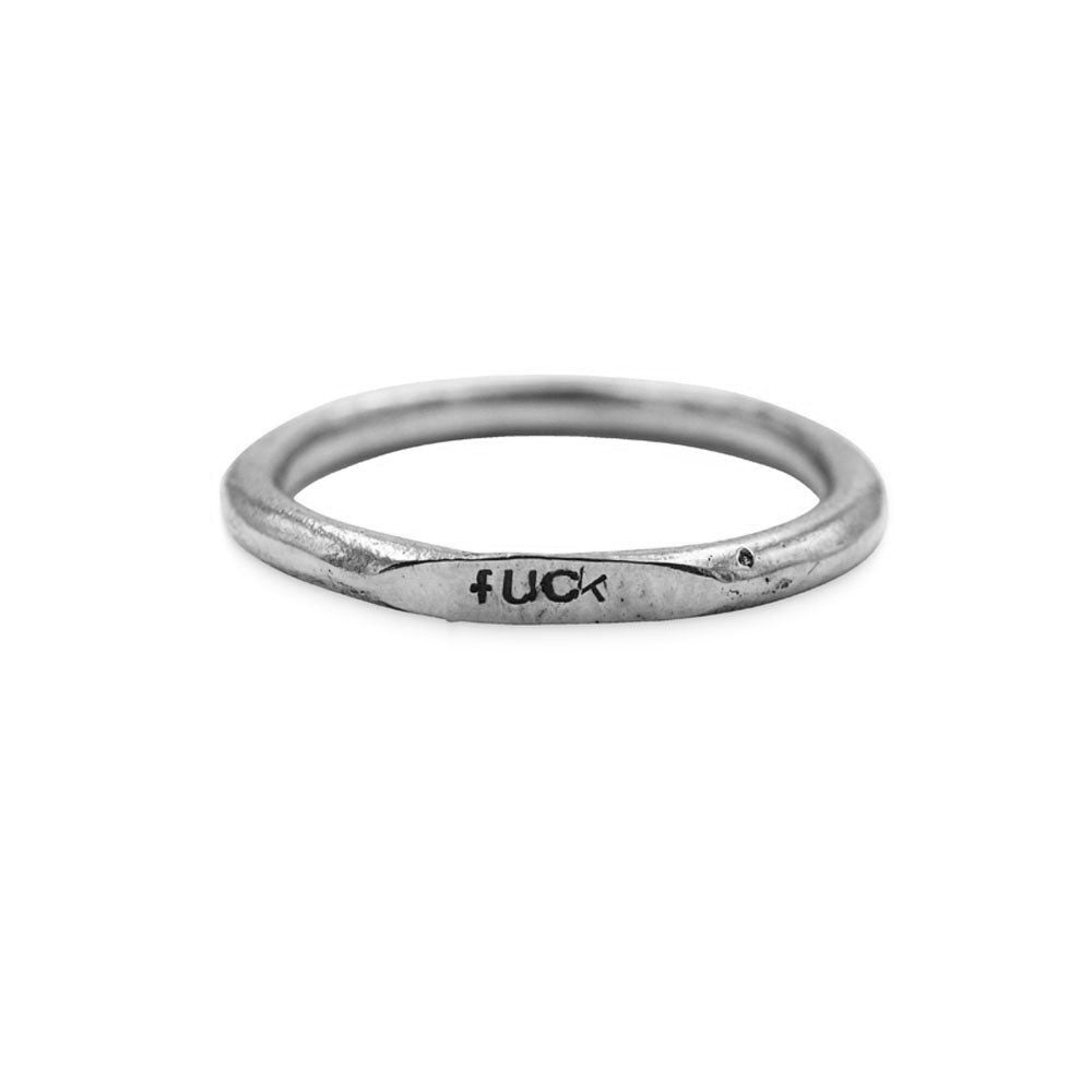 How’s everyone feeling? Anna designed this ring for the current times! Sterling silver skinny ring is sand cast in house and stamped like an ID bracelet in a horizontal bar with the f-word!