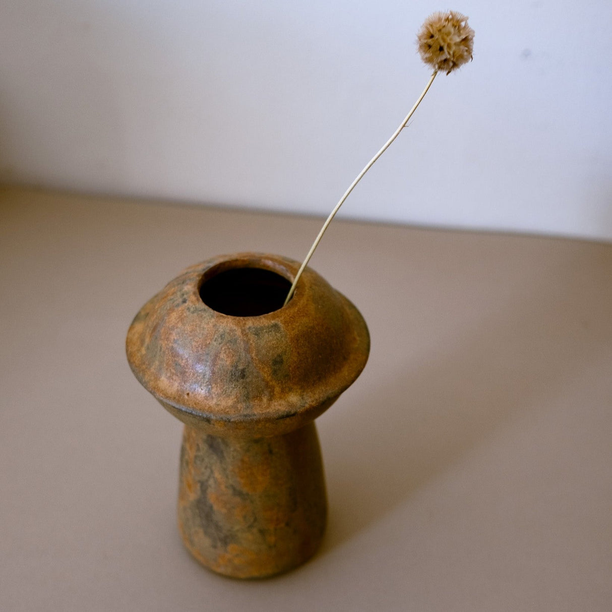 The Planet Series vases are inspired by planets encircled by their majestic rings. Different formations, just like the galaxies. Rust slip applied glaze pattern.