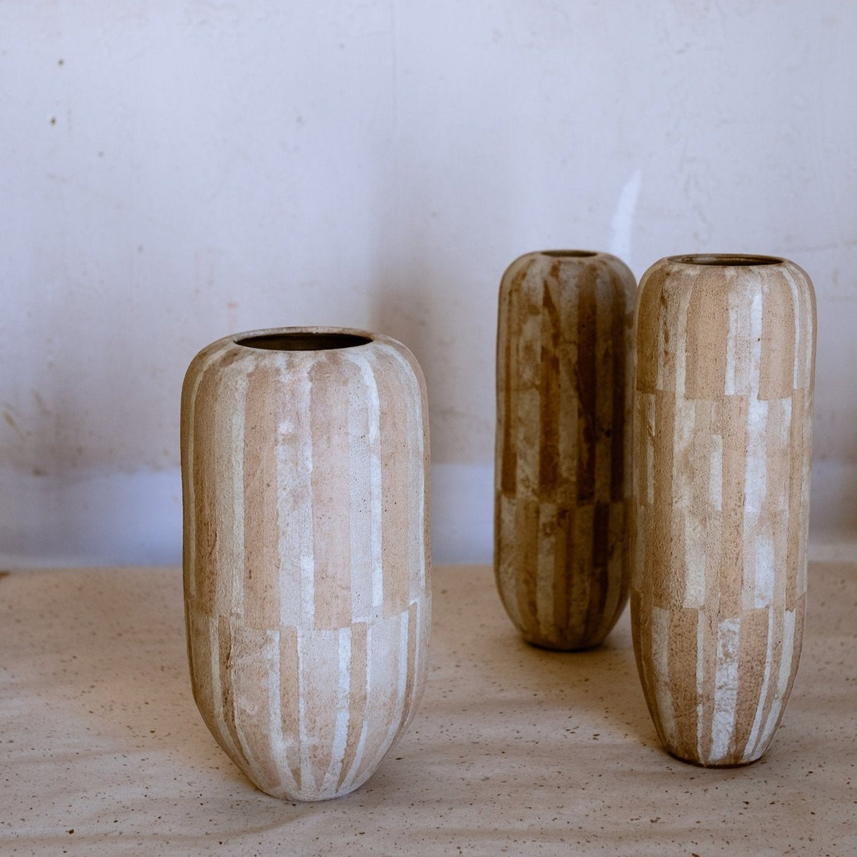 Painting “wallpaper” on ceramic vases. Subtle, soft and quiet vases that hold space for no flowers, big flowers, gentle flowers. We love how Linnan Ye of Neko Co Neko ceramics sees texture and uses objects as a foundation for design. 