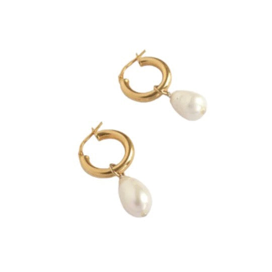 The Amy are a pretty pearl hoop earring pair with their unexpectedly sculptural, freshwater cultured pearls.