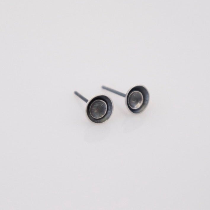 Hand fabricated petite sterling small double disc silver stud earrings. Esther Metals nestled two concave discs and gave them an oxidized patina. These are your new every day earrings!