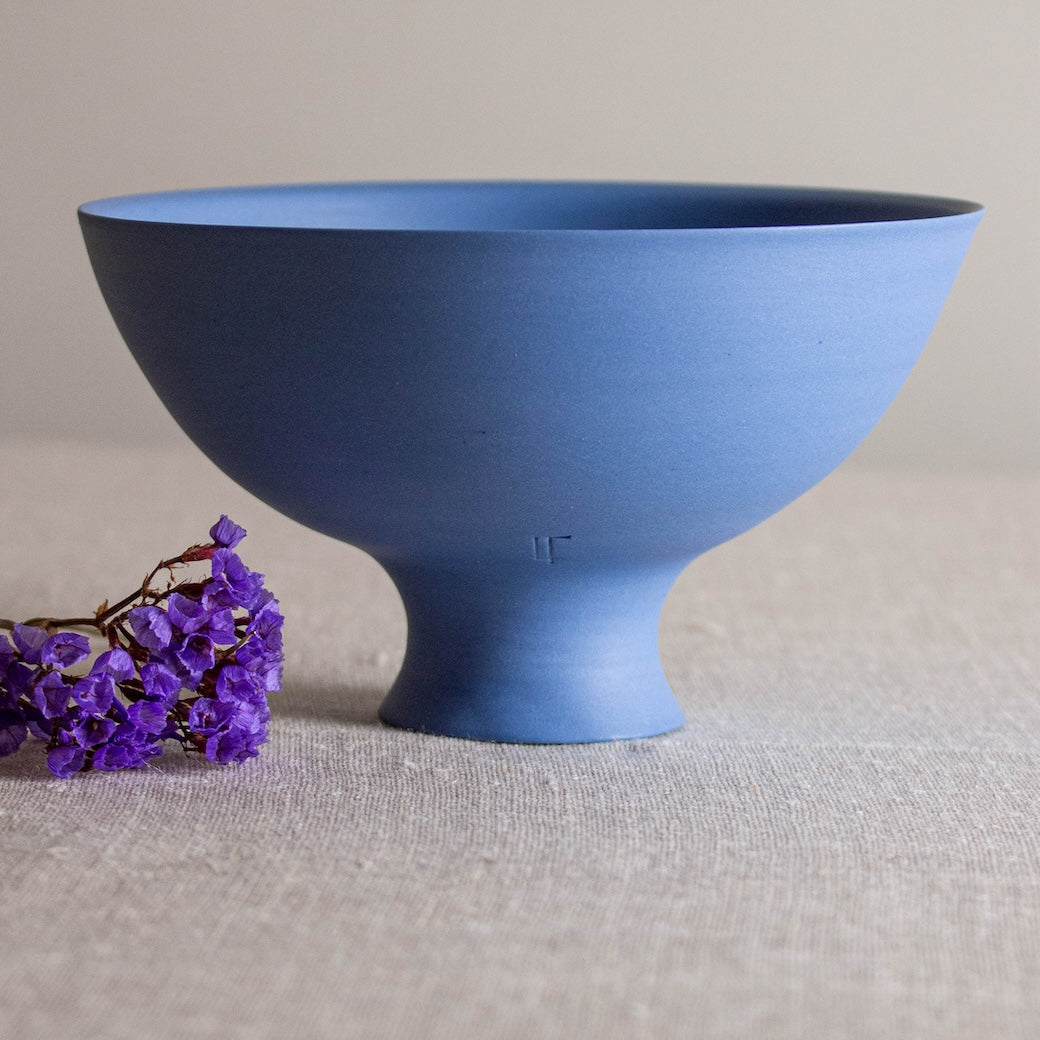 Lisa Fleming blue porcelain bowl form with flared foot, created on the wheel with Japanese Scandinavian simplicity in aesthetic and form.
