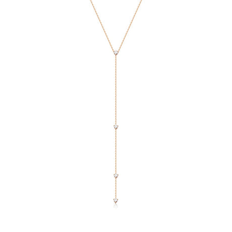A gorgeous Y or lariat-style necklace in 14K yellow gold, rose gold or white gold. 4 round white diamonds are suspended along the lustrous gold chain. Shown in Rose Gold.