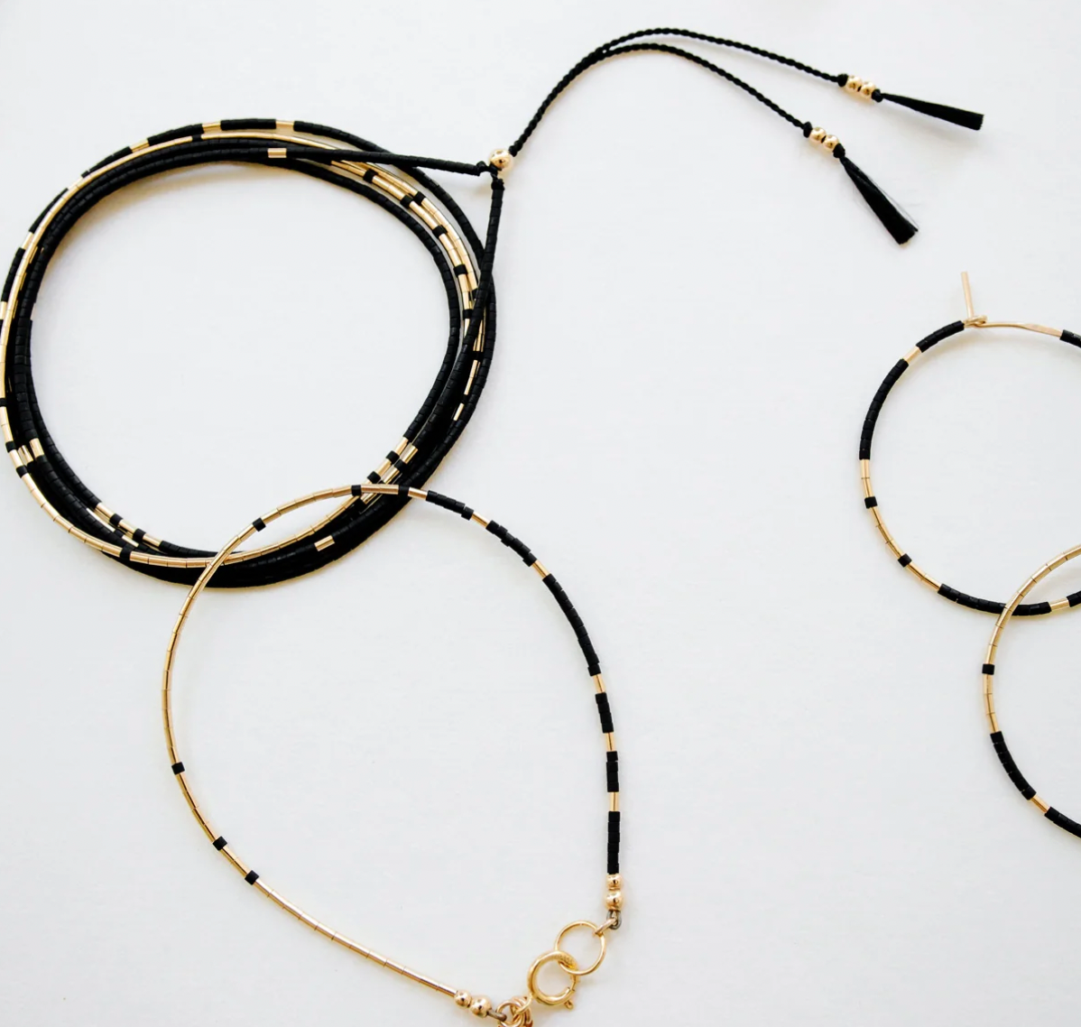 Neso wrap, Aitne Bracelet and Pan Hoops in Ink