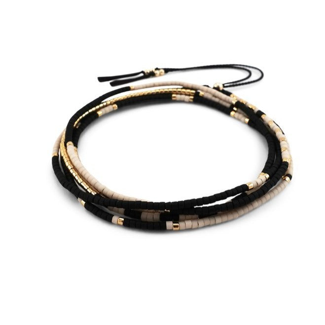 The Sonoran is a convertible necklace to wrap bracelet featuring playful patterns and designs made with Japanese glass beads. Polar