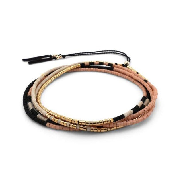 The Sonoran is a convertible necklace to wrap bracelet featuring playful patterns and designs made with Japanese glass beads. Sienna