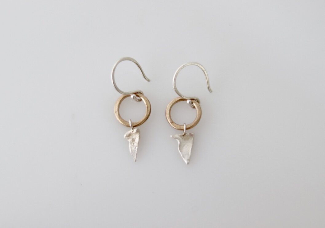 These elegant and subtle Summer Solstice earrings designed by Esther Metals capture the moment when the sun travels the longest path through the sky, giving us a day with the most light.