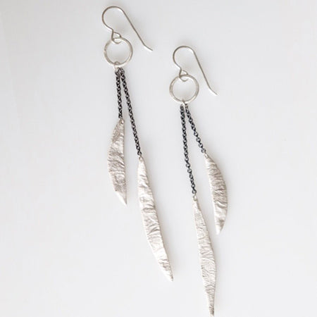 Esther Metals Feathery Earrings will be your go-to earrings with their glistening silver handcrafted feathery wings.