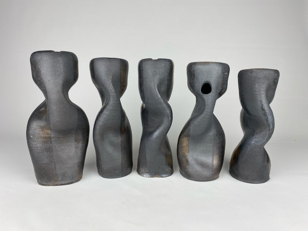 We love a dramatic vase to layer with other objects. Ian Hazard Bill makes these one-of-a-kind wood fired ceramic gesture vases perfect for a freestyle bouquet. A few have a single drilled hole for floral magic.