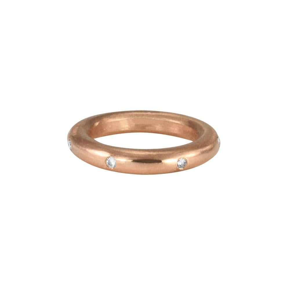 Stunning layered or alone–goes with everything, thick round stacking rings. Mixed metals available in sterling silver; 14k yellow, white or rose gold; or platinum. Take your stack to another level, embellished with diamonds and gems. 14k rose gold shown with white diamonds.