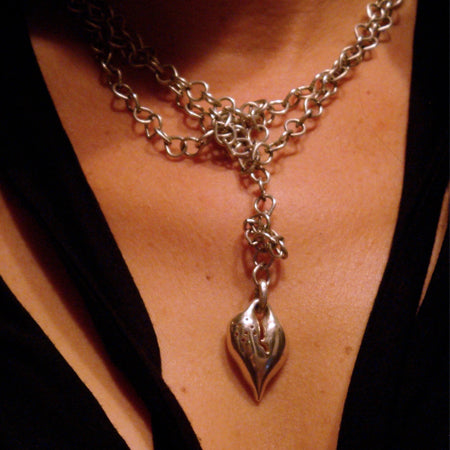 Jeffrey Levin's Healed Heart is a talisman to be full once again. Shown on model. (Chain not available.)