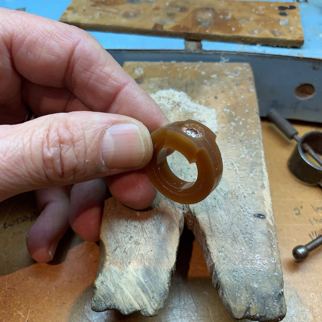 The process continues as Jeffrey Levin hand carves the setting in wax.