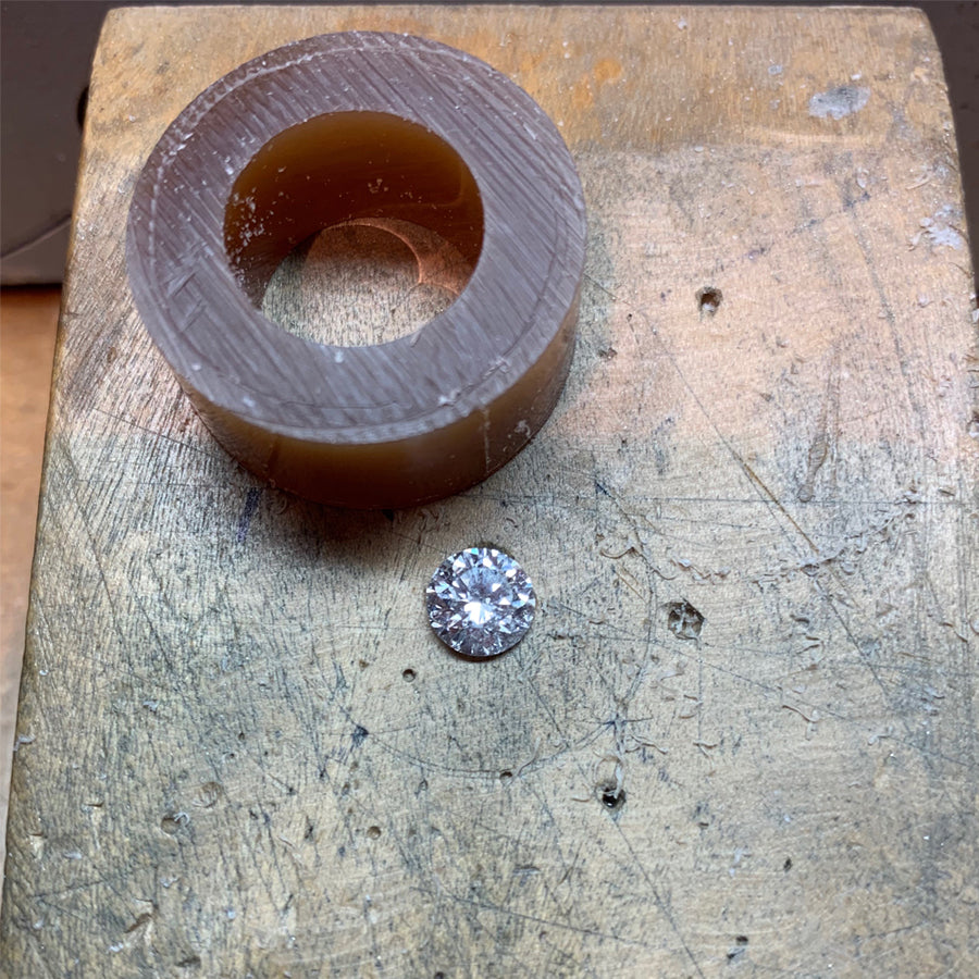 Custom Engagement Ring Process. Carving wax to create the setting and feature the diamond. We source diamonds and gems and we're also happy to work with an heirloom stone you have in your family.