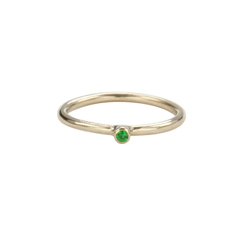 Jeffrey Levin Super Skinny stacking ring in 14K yellow gold with single stone green tsavorite (green garnet) is delicate and designed for stacking.