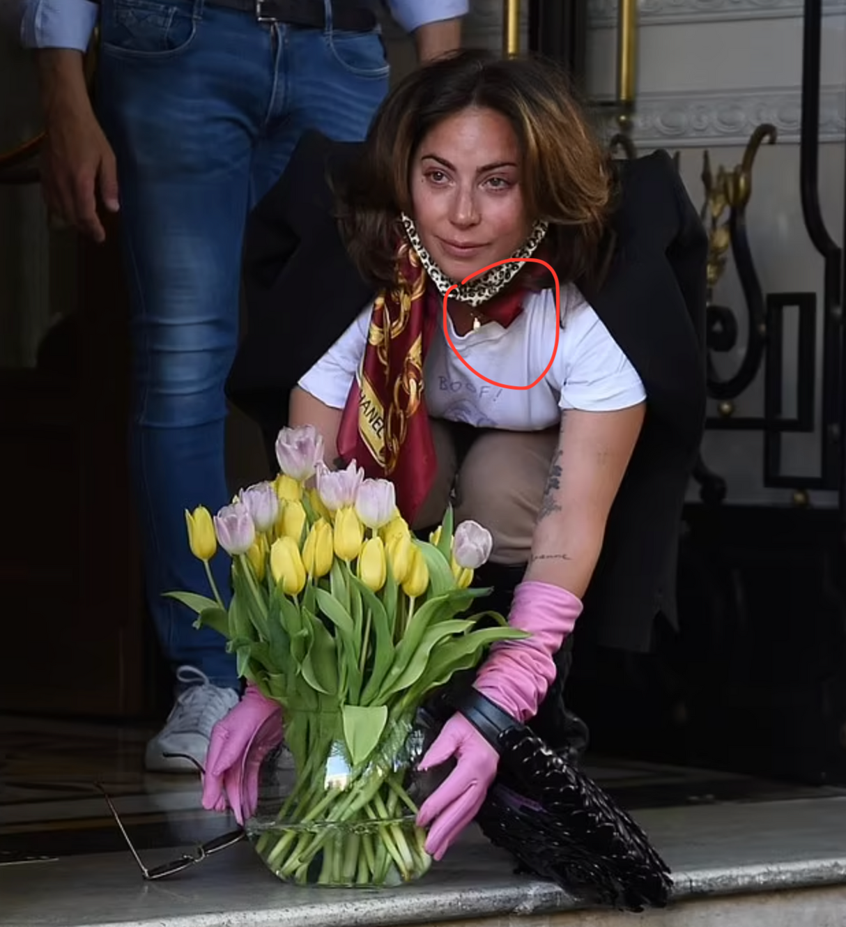 Wearing Jeffrey Levin Gold Dog Tag with Tiny Heart Necklace, Lady Gaga thanks fans in Rome after wrapping up House of Gucci movie