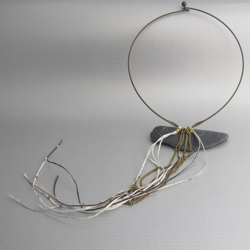 This is one of our fave necklaces in a collar version with its gathering of long chain and Japanese paper. Maddalena says she finds sources of creativity and directions for her jewelry collections everywhere around her.