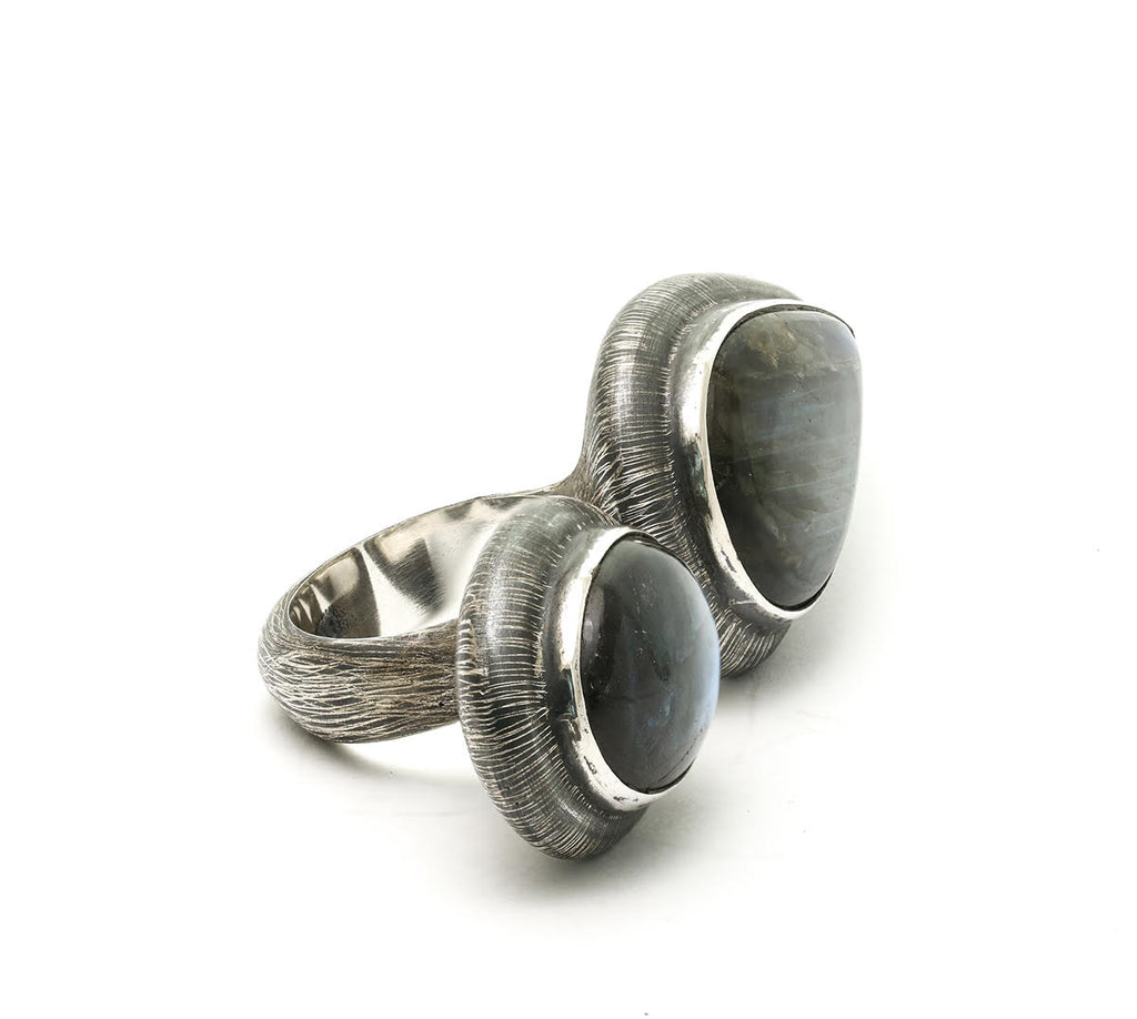 Oval and angular labradorite stones set in etched and oxidized sterling silver by Mariella Pilato. Side view