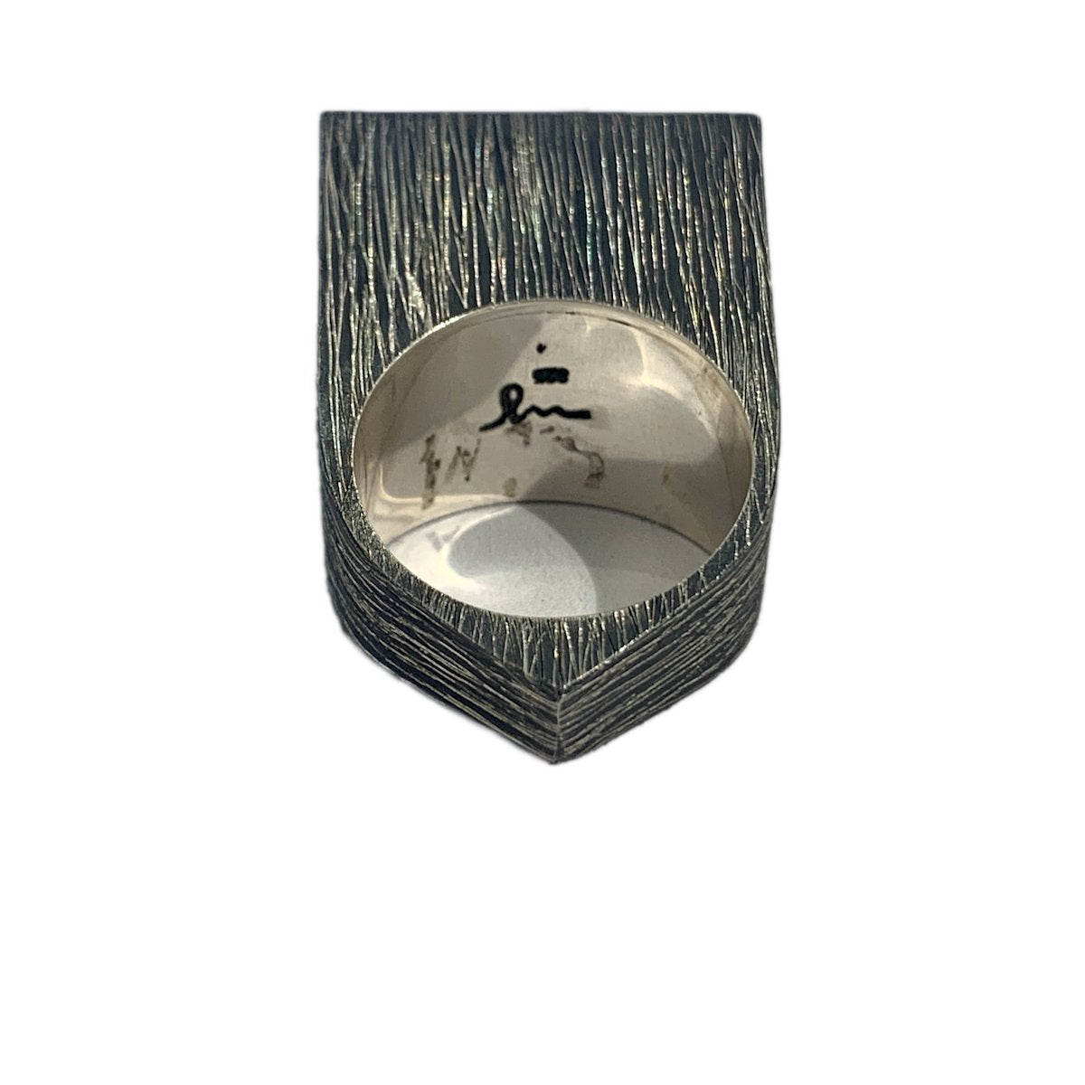 The high contrast and strong profile of these light box rings both draws in and reflects the light. Adorn your ring stack with this mood lifting accoutrement! Bottom view.