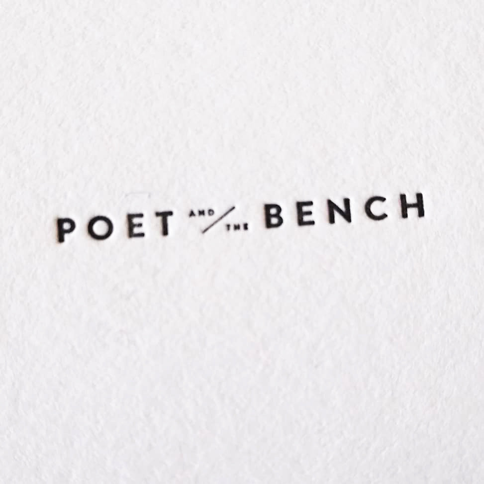 A letterpress detail of the Poet and the Bench logo from our Day Tripping map.