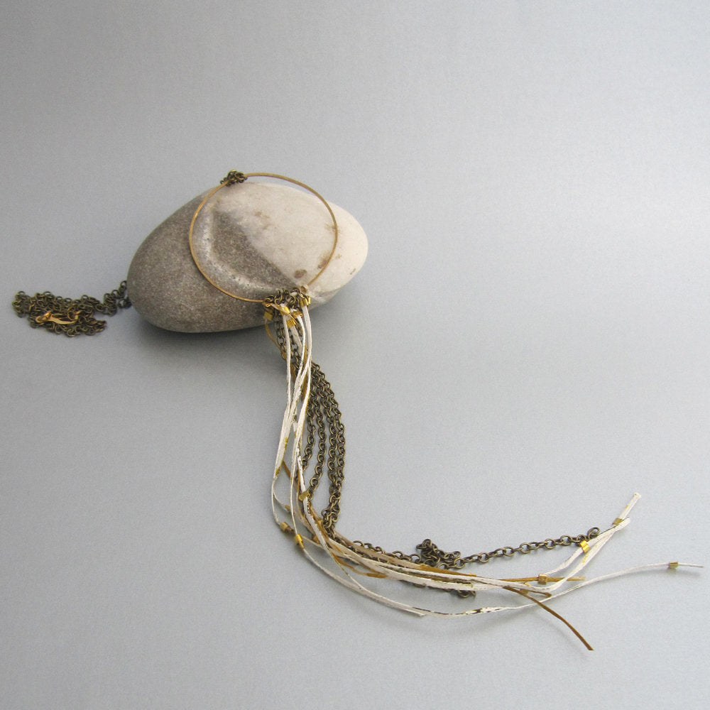 This is one of our fave pieces with its gathering of long chain and Japanese paper. 