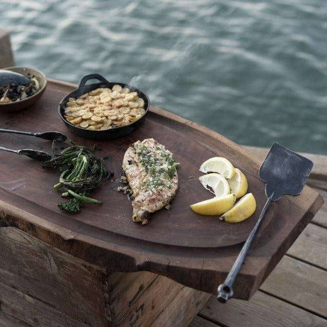 Hand forged grill spatula is both artful and functional. Bought individually or as part of a three-piece set–all pieces are beautiful and robust yet lightweight. A Terasu design collaboration between Oakland and Sausalito based metalsmiths. Grill set shown in use.