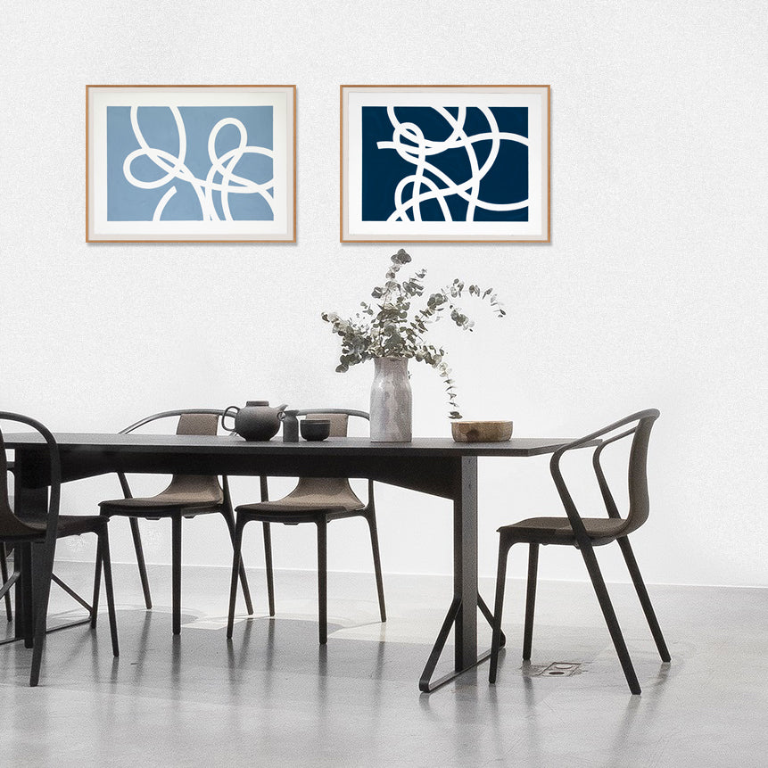 Jeffrey Palladini's Thread Series #2, Blue Almost Black, is his part of his most recent thesis and an exploration across materials. In this brand new work, the random looping and twisting patterns of a dropped length of twine are a seductive metaphor for the way we get from our aims and dreams to the outcomes. Shown framed (sold unframed) in a dining room setting with Thread Series #3 Pale Blue.