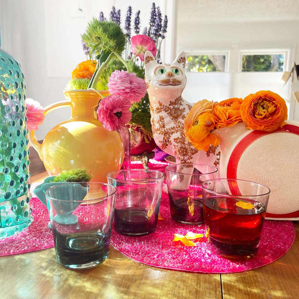 Modernist smoky grey lowball or rocks glasses with a very slight taper are perfect for the every day.