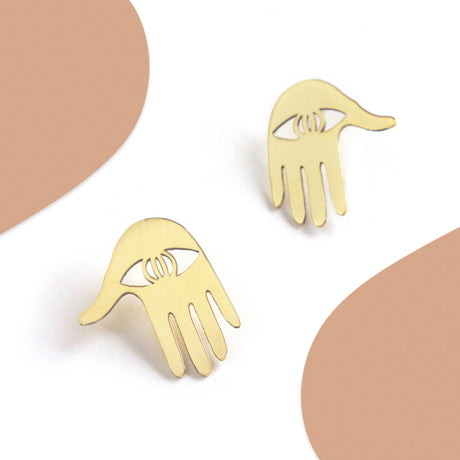 These earrings were created with the intention to protect against the evil eye but legend tells us the hamsa also gives the wearer harmony and success.