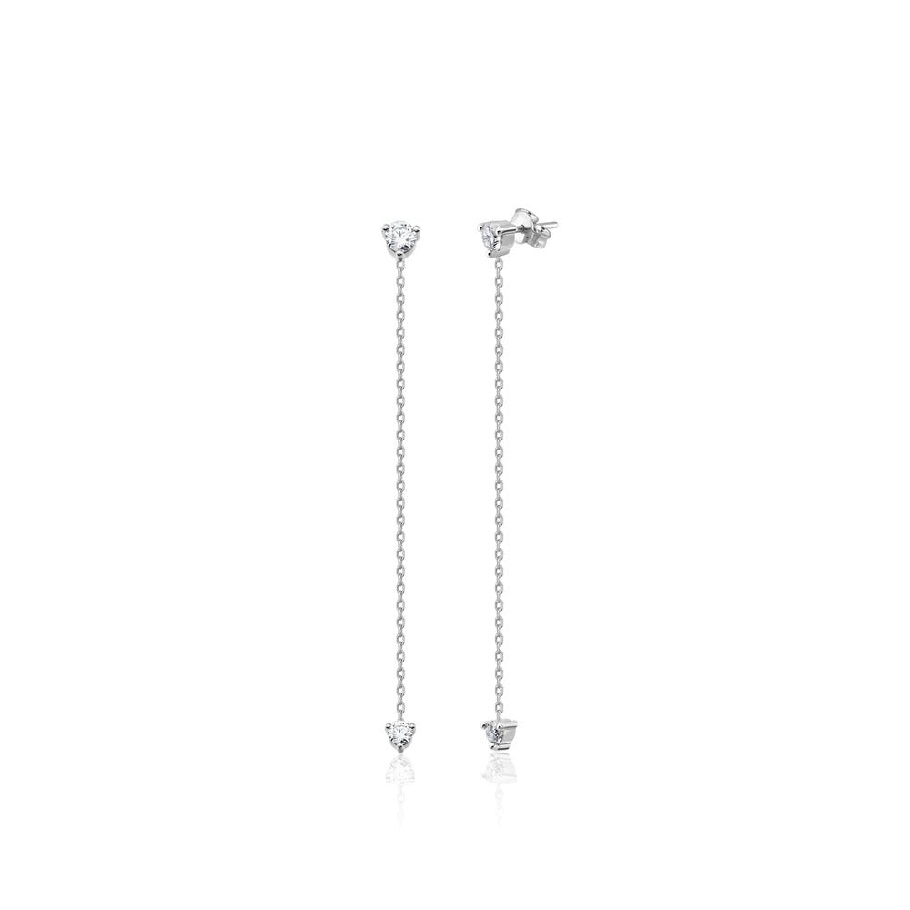 Elegant 14K white gold studs feature 2 diamonds on each earring –one at the tip and one at the bottom of the chain– and 5.8mm of hanging chain that add extra dimension and a fierce style. 