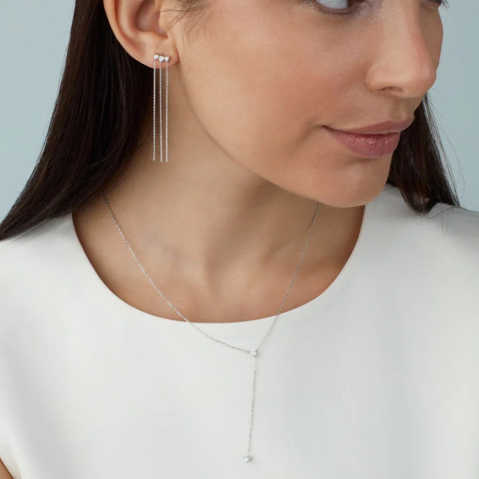 betul malik per diem 2 stone y necklace in 14k gold with 2 white ethically sourced diamonds. Shown on model