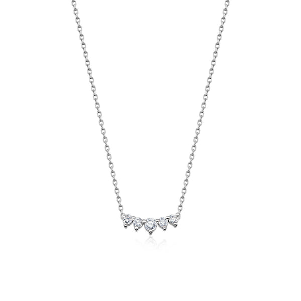 Five diamonds are clustered in a slightly curved bar in this elegant necklace paired with 14K white gold chain.
