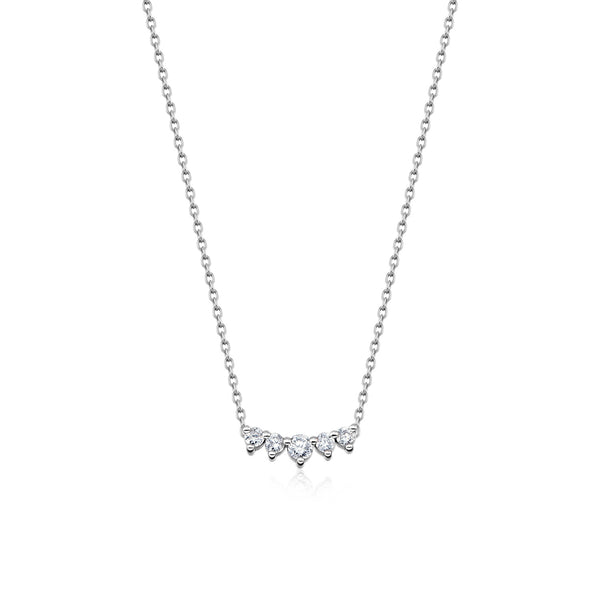 Five diamonds are clustered in a slightly curved bar in this elegant necklace paired with 14K white gold chain.