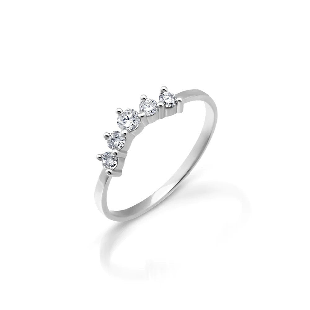 Light up your ring party with these delicate 5 diamond and 14K gold every day stacking rings. White gold pictured. Side view.