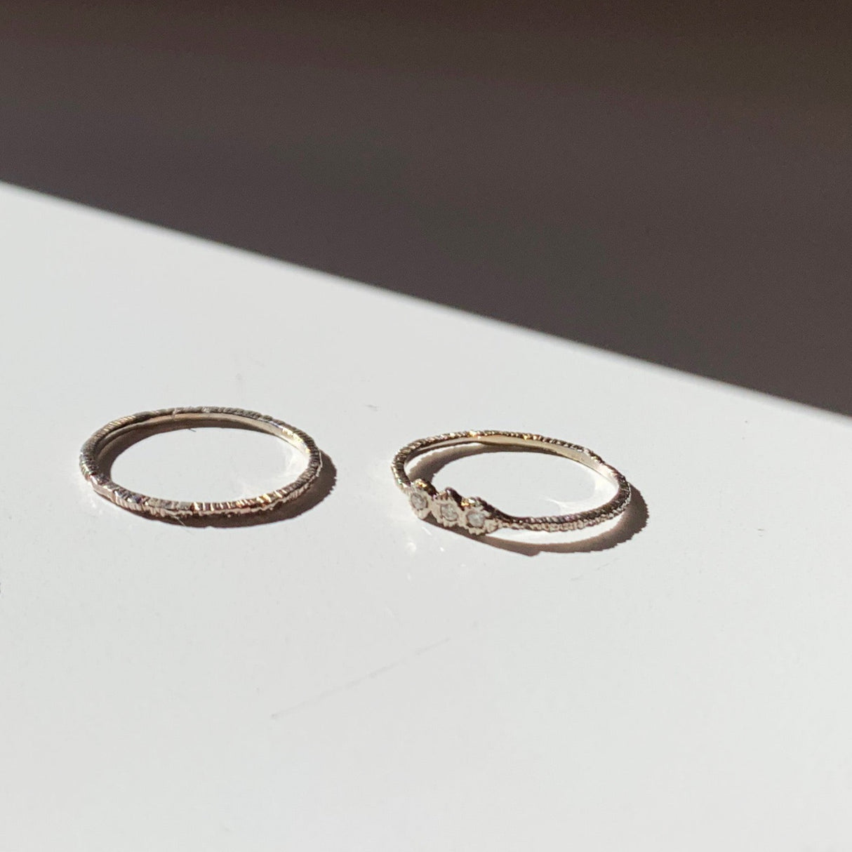 A thin textured wedding band or stacking ring by Danielle Welmond to add dimension to any ring stack.