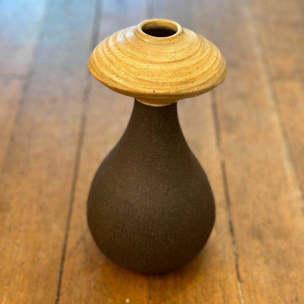 Dune Vase looks futuristic and ancient at the same time. This is the sand version. 