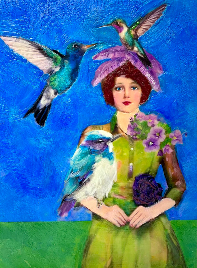 Encaustic collage depiction of a woman with humming birds and flowers against a blue background