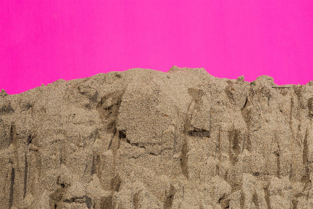 Create bold contrast with landscape photography. A surrealist study of perspective and angles in Amanda Rowan's Pink Sand